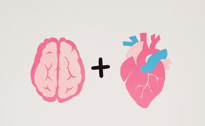 Brain and heart symbols on white background.