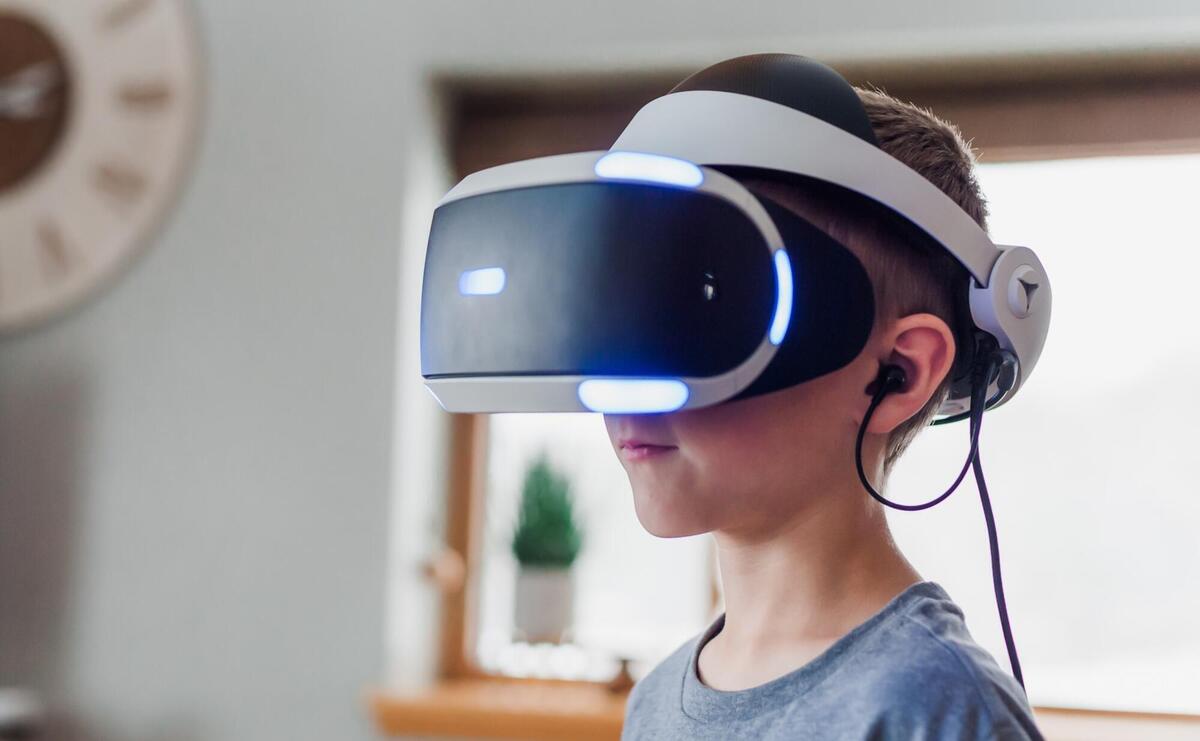 A child wearing a VR headset.